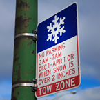 snow tow zone sign, no parking sign, weather sign, road sign, traffic sign, free stock photo, free picture, stock photography, royalty-free image