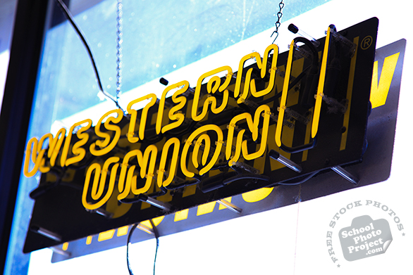 Western Union logo, Western Union neon sign, Western Union brand, corporate identity image, logo photo, free logo mark, free stock photo, free picture, royalty-free image